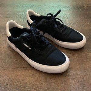 Low-top Adidas canvas shoes in black, size 5.5 men (7.5 women)
